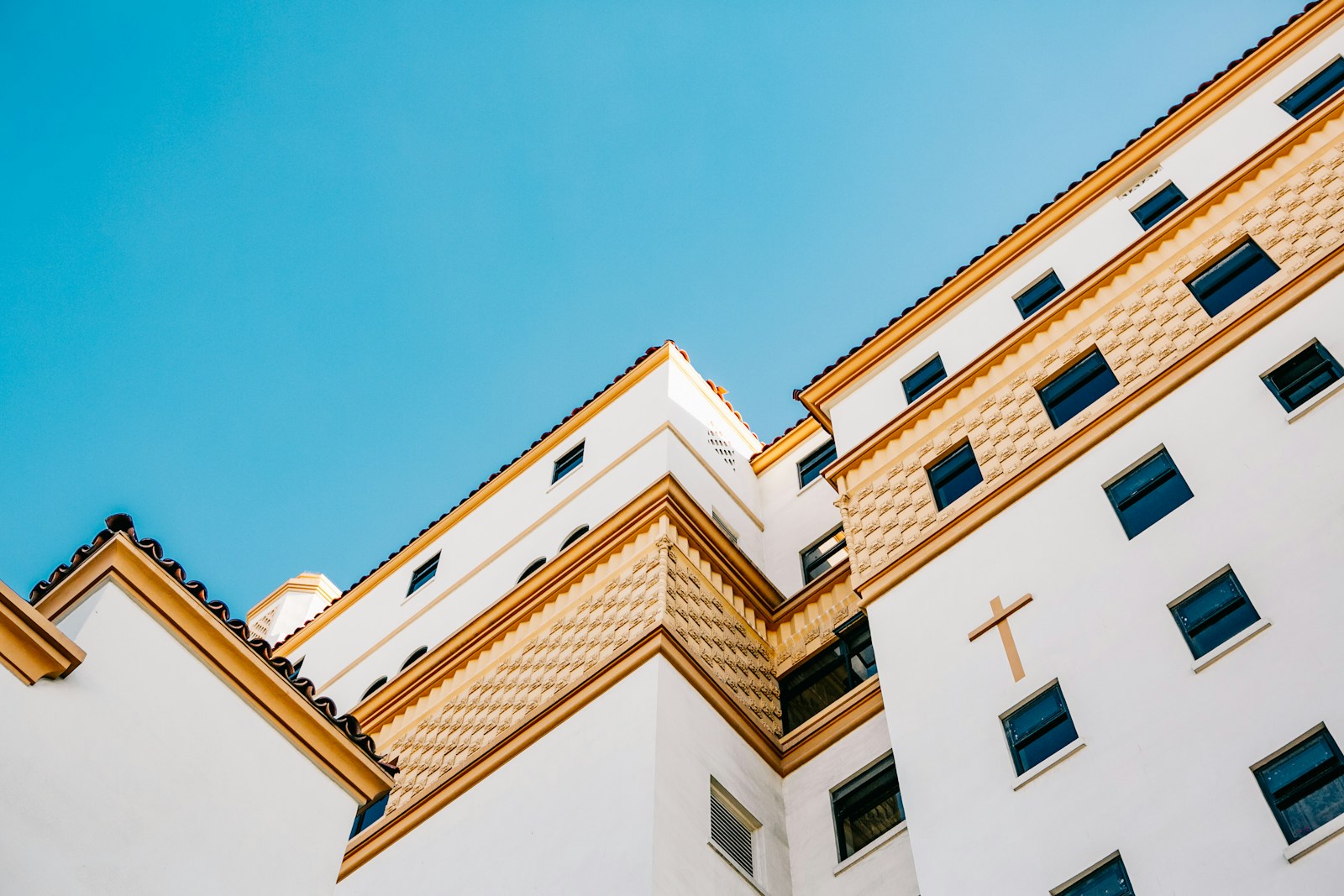 white and yellow concrete building, landlord