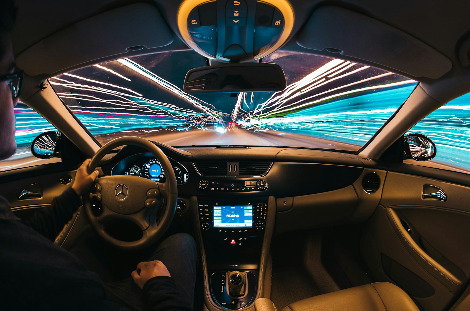 time lapse photography of man riding car, auto